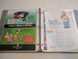 Custom Gray Binder 1 of 2 - Approx 50 pages of clippings