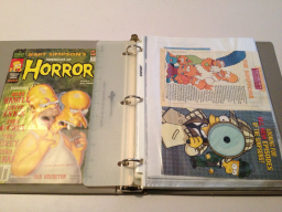 Custom Gray Binder 2 of 2 - Approx 50 pages of clippings